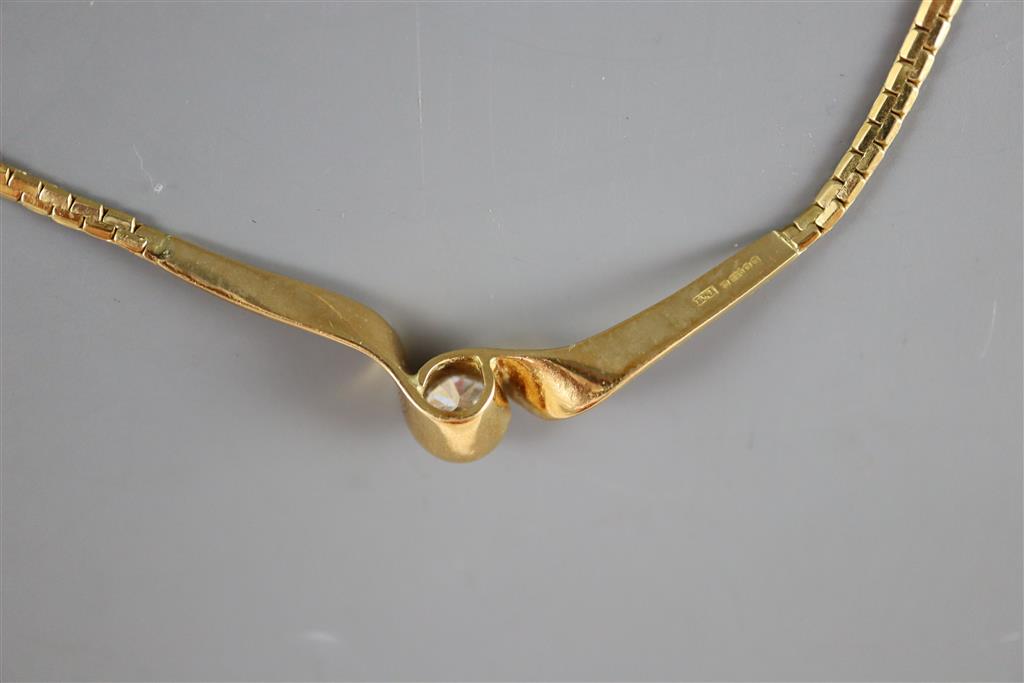 A modern 18ct gold flattened link and solitaire diamond set necklace,